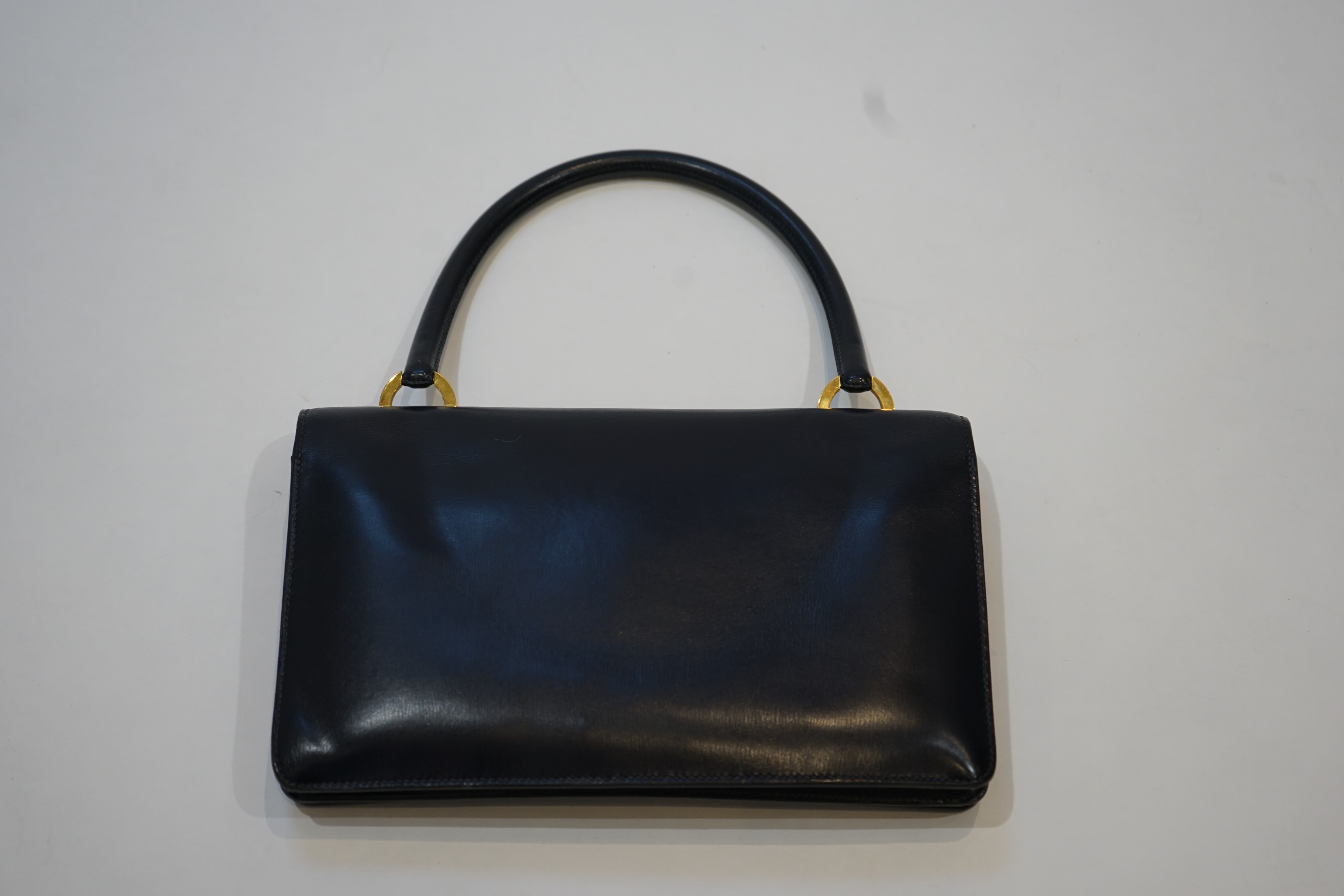 A vintage Hermes Ring handbag in bleu marine Veau Box leather, circa 1960-1969 27cm.